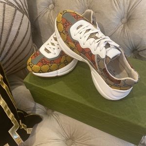 Gucci women’s Rhyton multicolor runner fashion sneaker. Never worn brand new